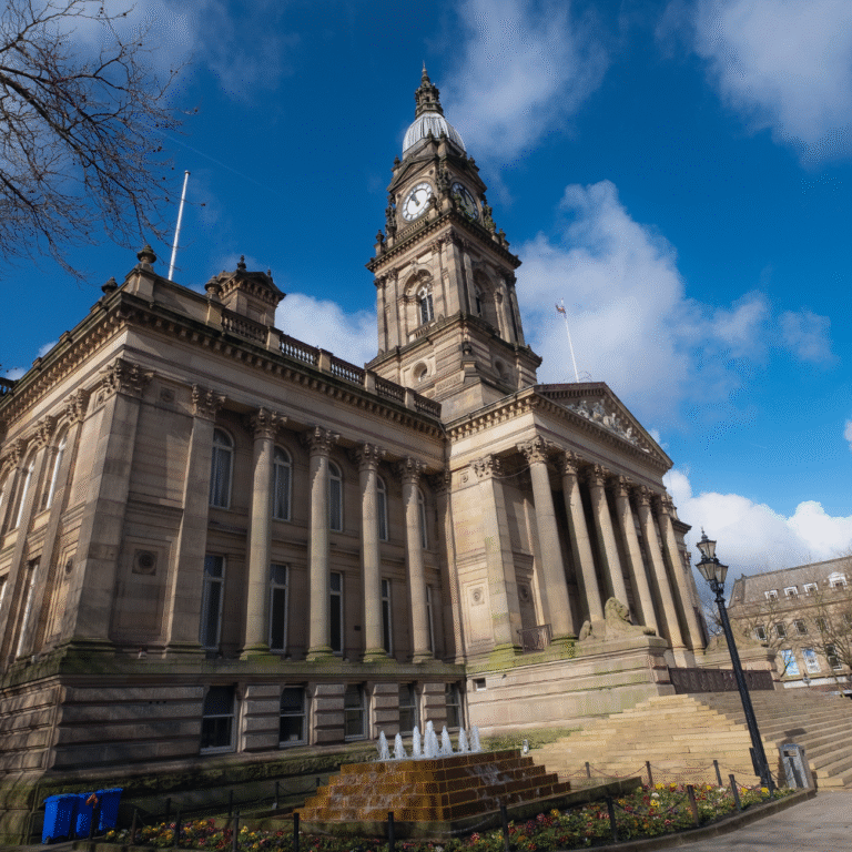 Bolton Town Hall with clock tower and fountain on Victoria Square, a landmark in the heart of Bolton where our marketing agency helps local businesses grow.